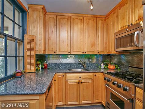 honey maple cabinets with stainless steel and blue pearl granite|honey maple granite cabinet colors.